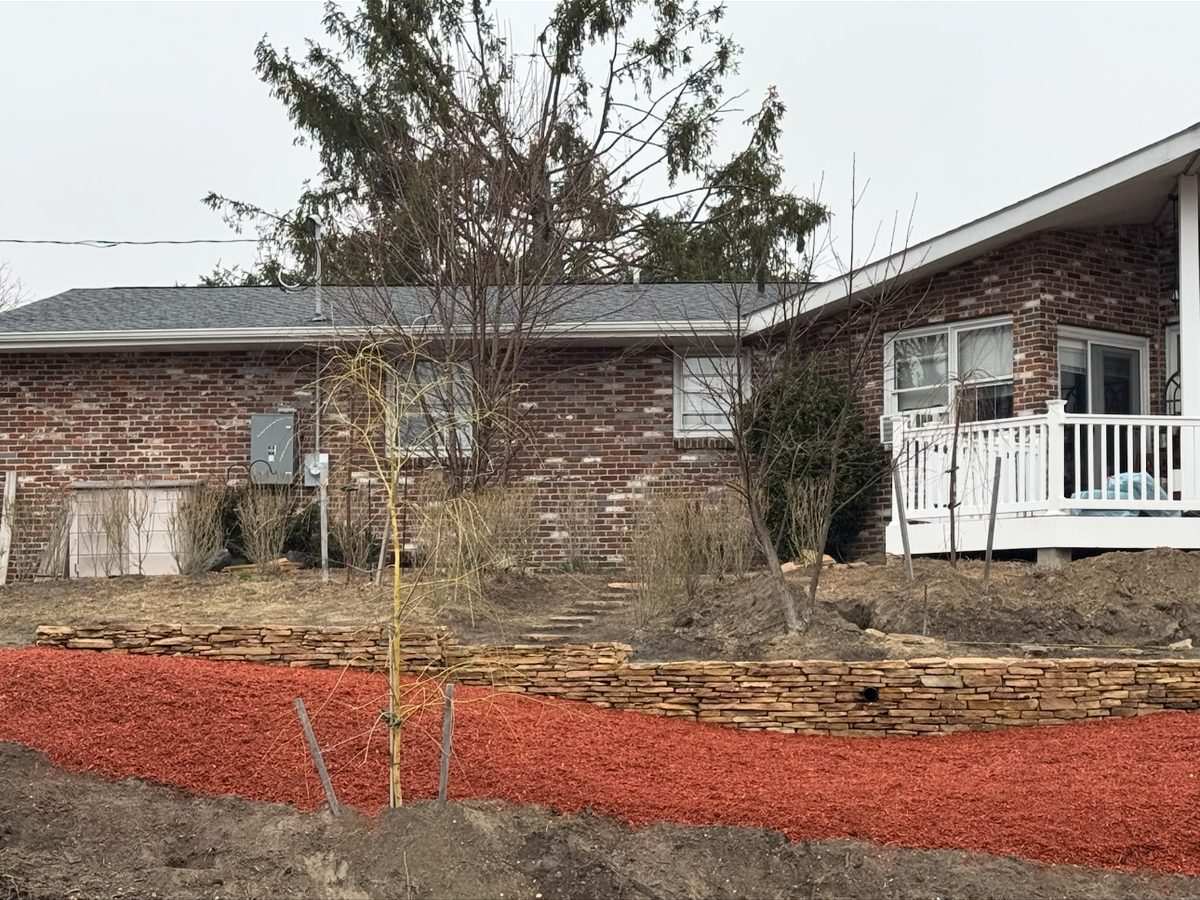 Red mulch beds, front of home
